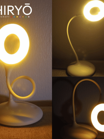 RELAX Sunset amber light lamp night light gooseneck USB rechargeable battery powered no blue light desk lamp emitting warm amber glow for sleep and evening lighting lifestyle image set in a lounge living room environment