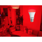 red light bulb no blue light B22 CHIRYŌ Light Therapy red 630nm lighting illuminating a UK living room in autumn during the evening, with darkness outside the window around 6pm, demonstrating red light use after sunset.