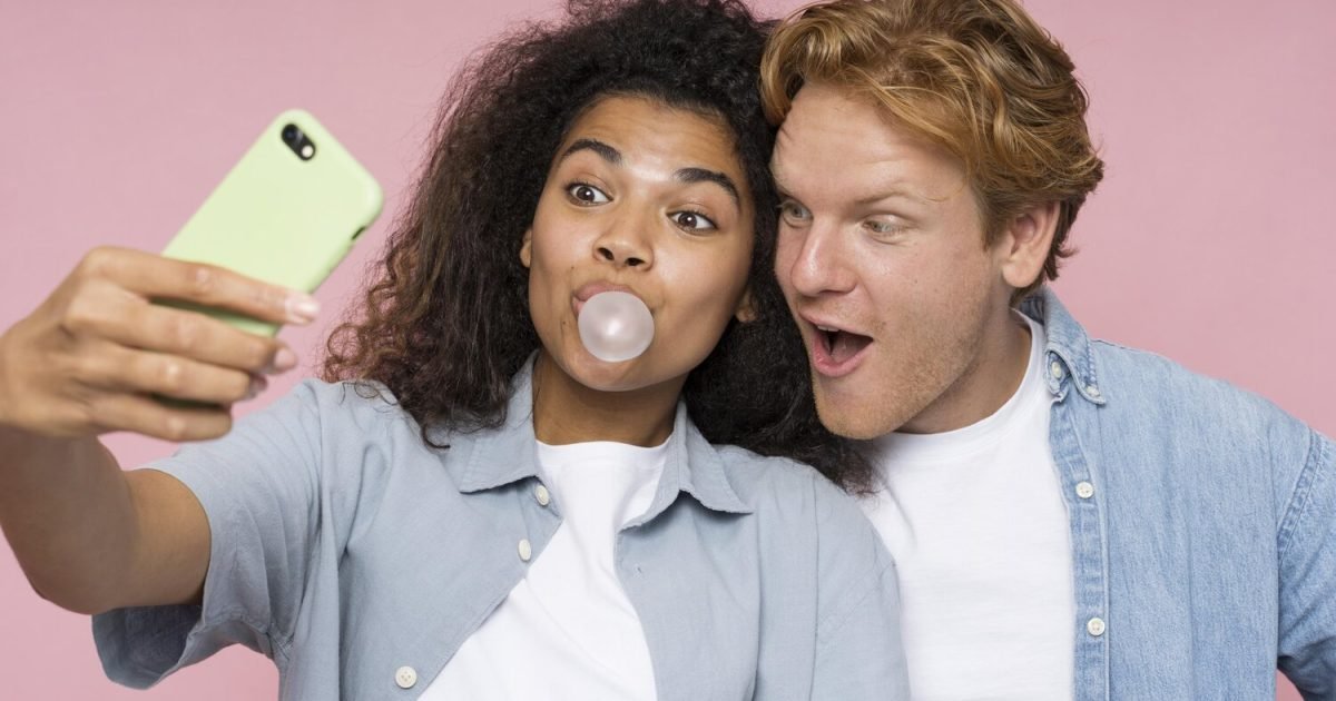 Ointments and Skincare wisdom article blog how to maximise the benefits of LED Light Therapy CHIRYO Light Therapy happy teenagers young adults taking a selfie female blowing a ball from bubble gum Ointments and Skincare wisdom article blog how to maximise the benefits of LED Light Therapy CHIRYO Light Therapy happy teenagers young adults taking a selfie female blowing a ball from bubble gum